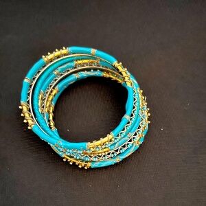 Turquoise and gold bracelets 7 each stack